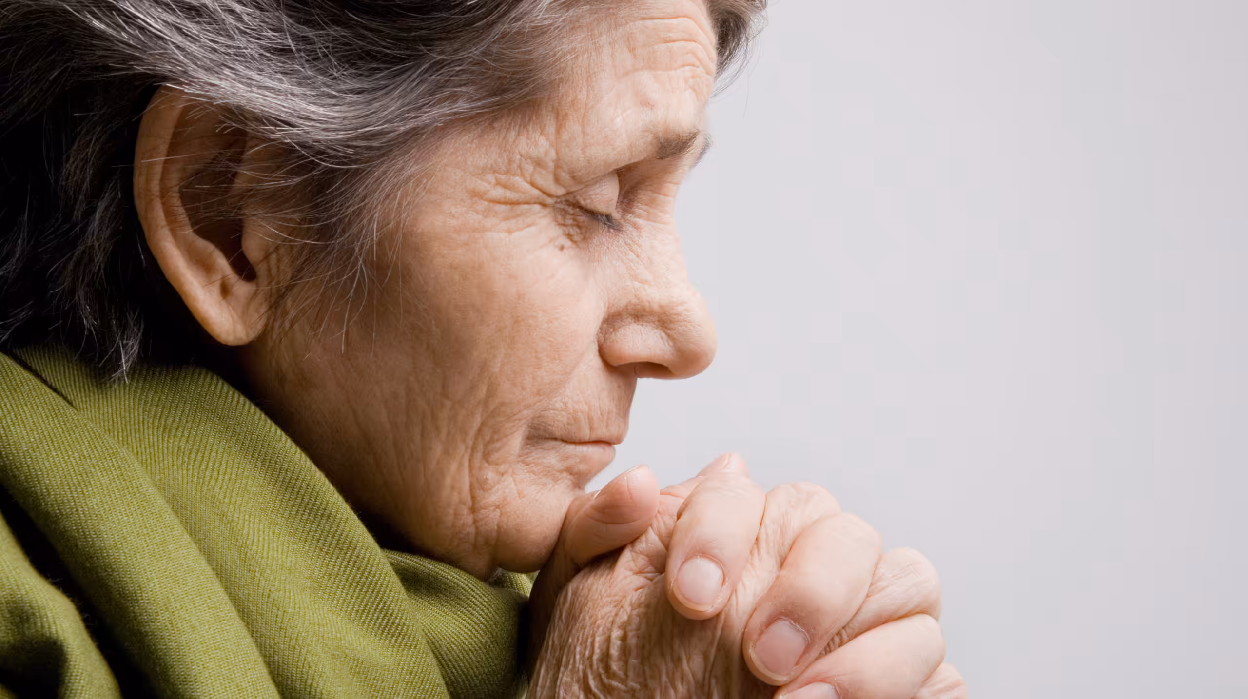 old woman praying