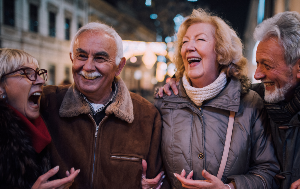 A group of people laughing and having fun