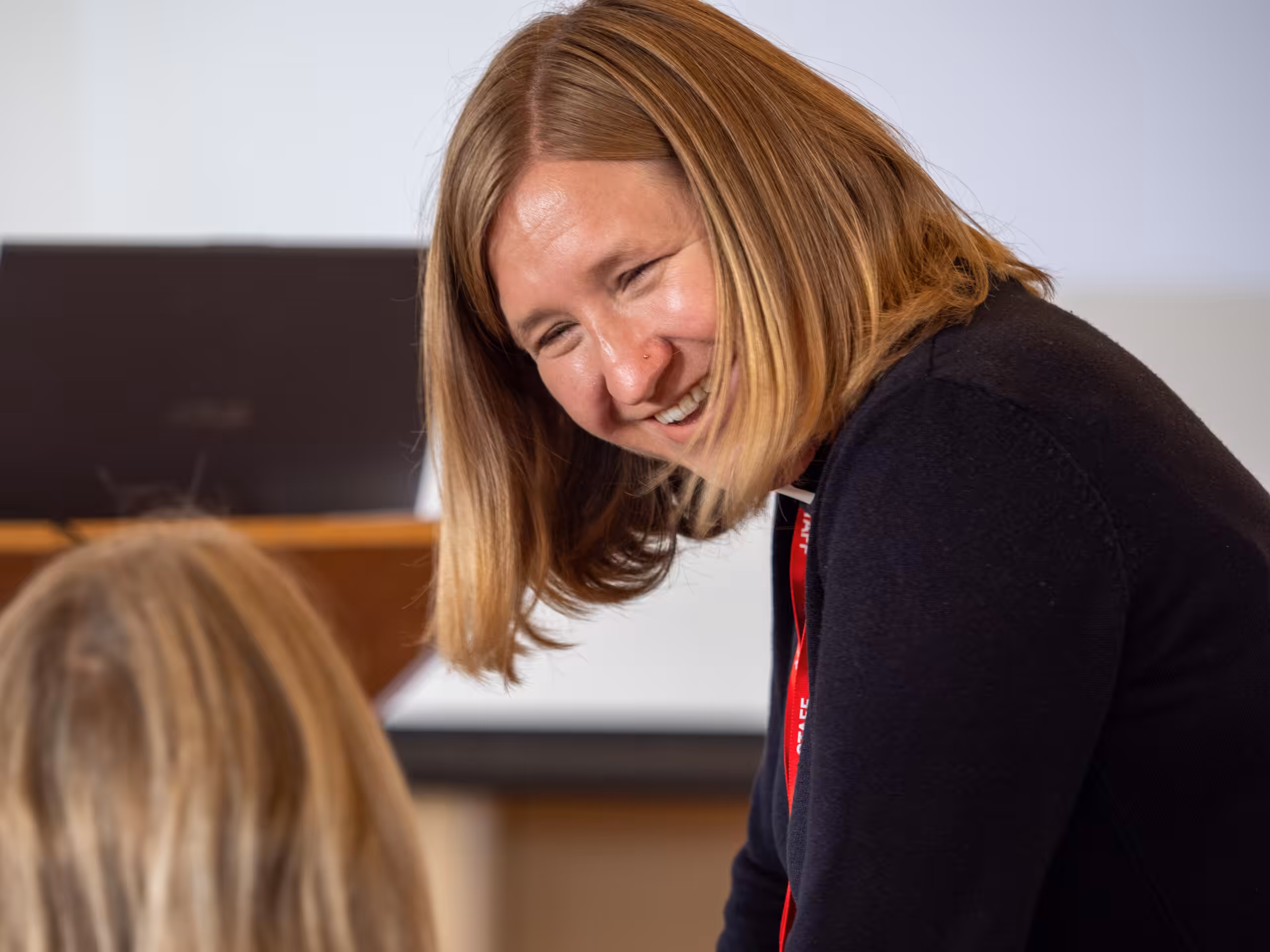 sarah helping student